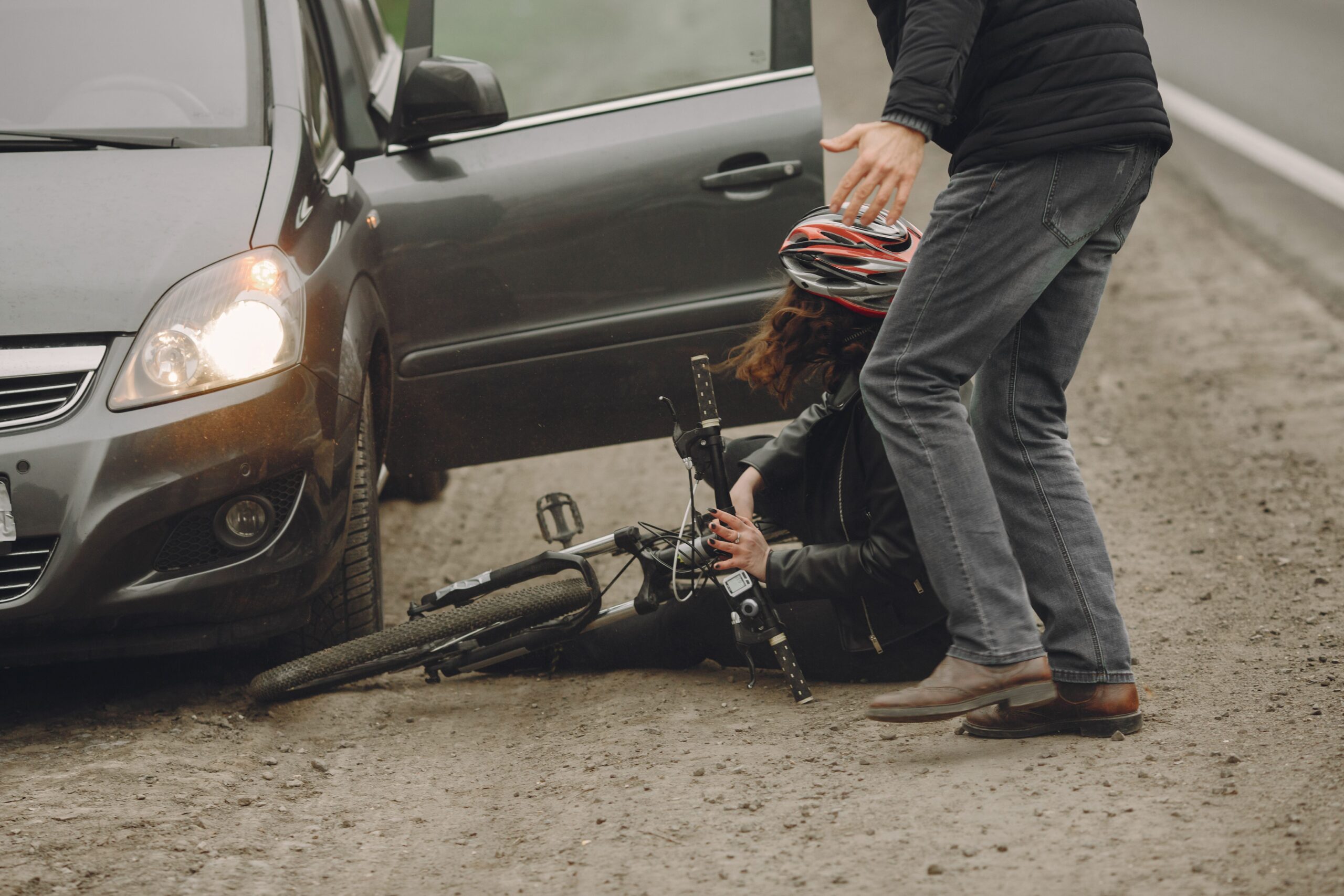 Fietser op de grond.