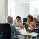 Expats working together in a Dutch office.