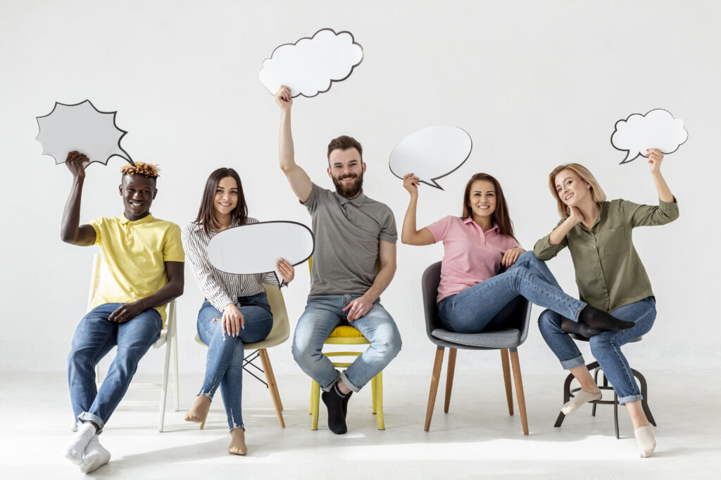 People holding speech balloons.